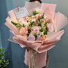 Bó hoa hồng phấn, cúc gerbera và hoa baby gói giấy hồng