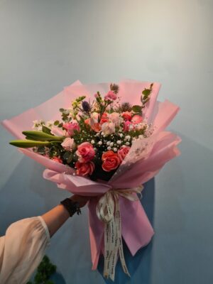 Bó hoa hồng cam, ly hồng phối baby gói giấy hồng